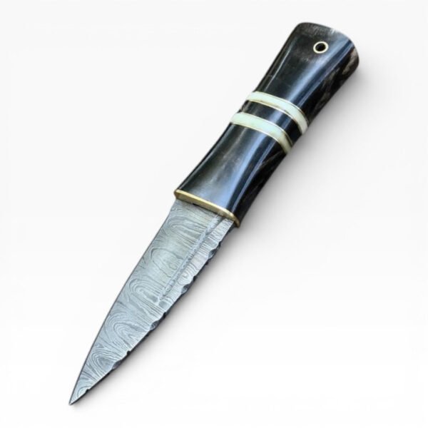 Decorative knife with a black handle and silver blade on a white background
