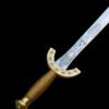 Decorative sword with gold handle and blue blade on a black background