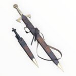Decorative sword with sheath on a white background