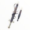 Decorative sword with ornate handle and sheath on a white background