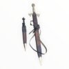 Decorative sword with sheath on a white background