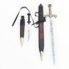 Two swords with ornate sheaths on a white background